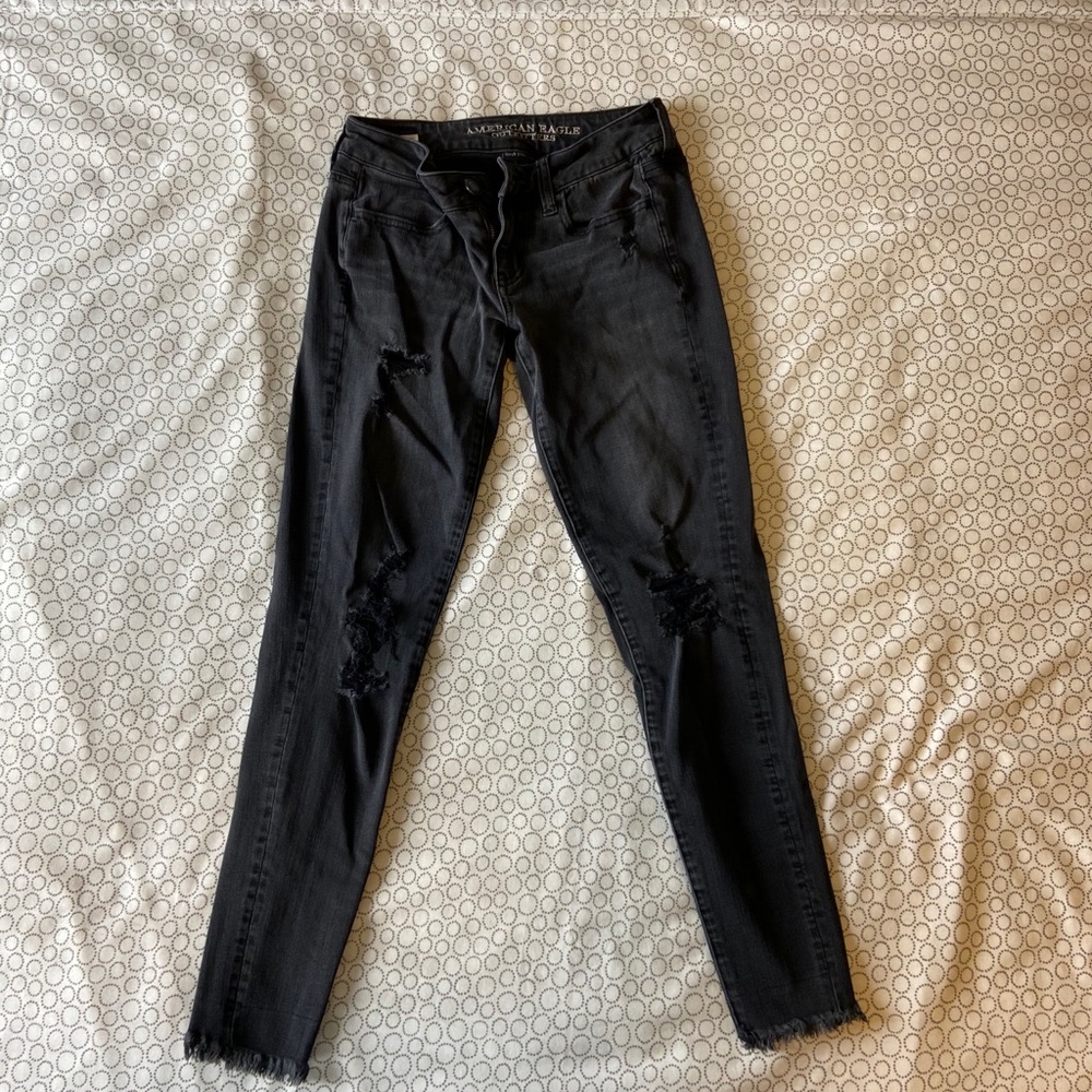 black ripped jeans